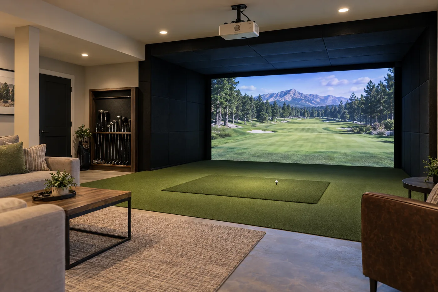 Basement golf simulator room with a dark screen enclosure, turf, and lounge seating